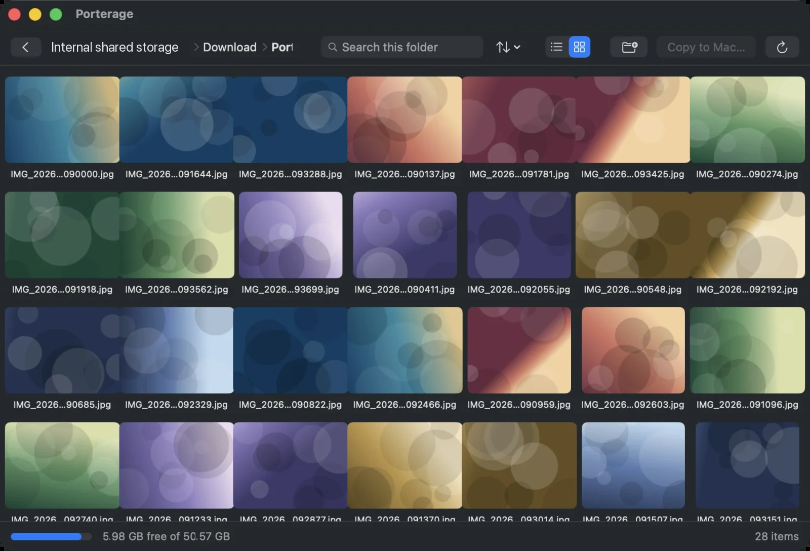 Porterage showing a folder of photos as a grid of thumbnails, with a breadcrumb, search field, sort control and a free-space readout along the bottom.